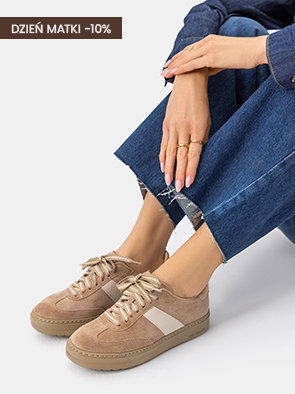 Woman wearing beige trainers with jeans, Mother's Day 10% discount offer.
