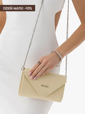 Woman in white dress holding a beige handbag with chain strap, Mother's Day 10% off offer.