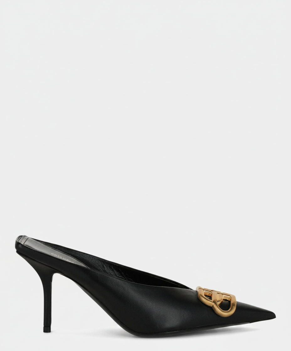 Black leather mule heel with gold buckle detail.