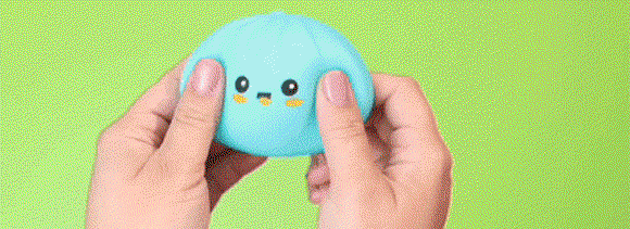 hand stretching a blue dumpling toy
