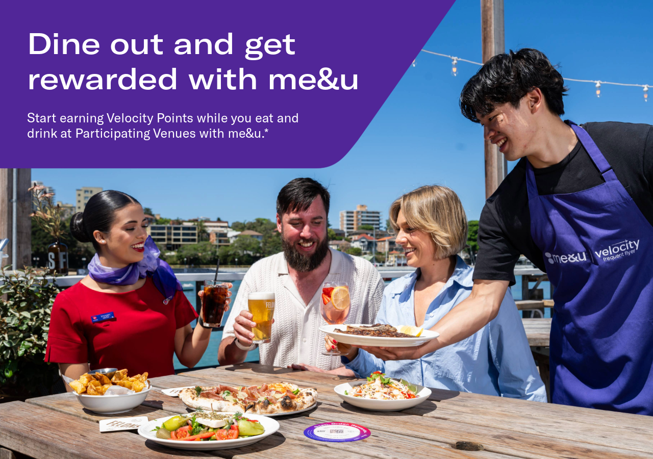 Four people eating at restaurant 