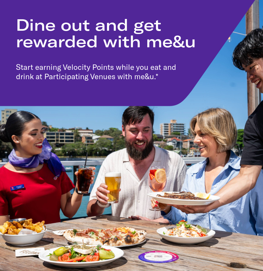 Four people eating at restaurant 