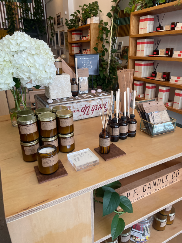 store display of candles, reed diffusers, incense, and air fresheners