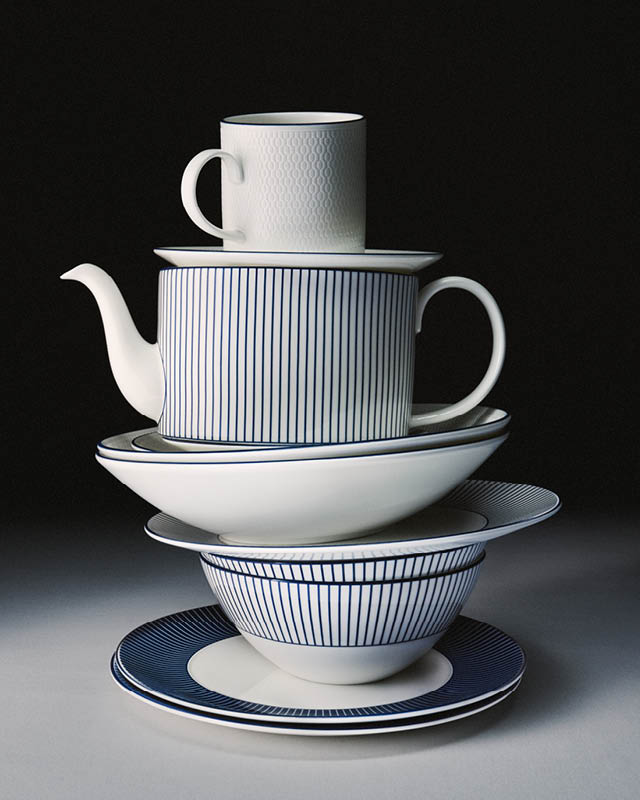 stack of blue and white crockery in a tall tower