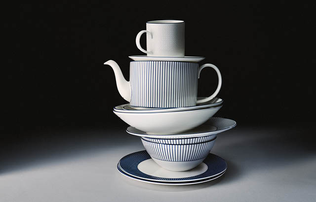 stack of blue and white crockery in a tall tower