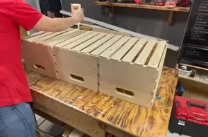 She attaches 3 wood crates for a hidden storage hack we can't wait to copy