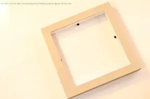 Flip a picture frame to make small plants look amazing around your home