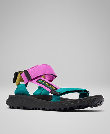 A pink, blue, and green sandal against a grey background.