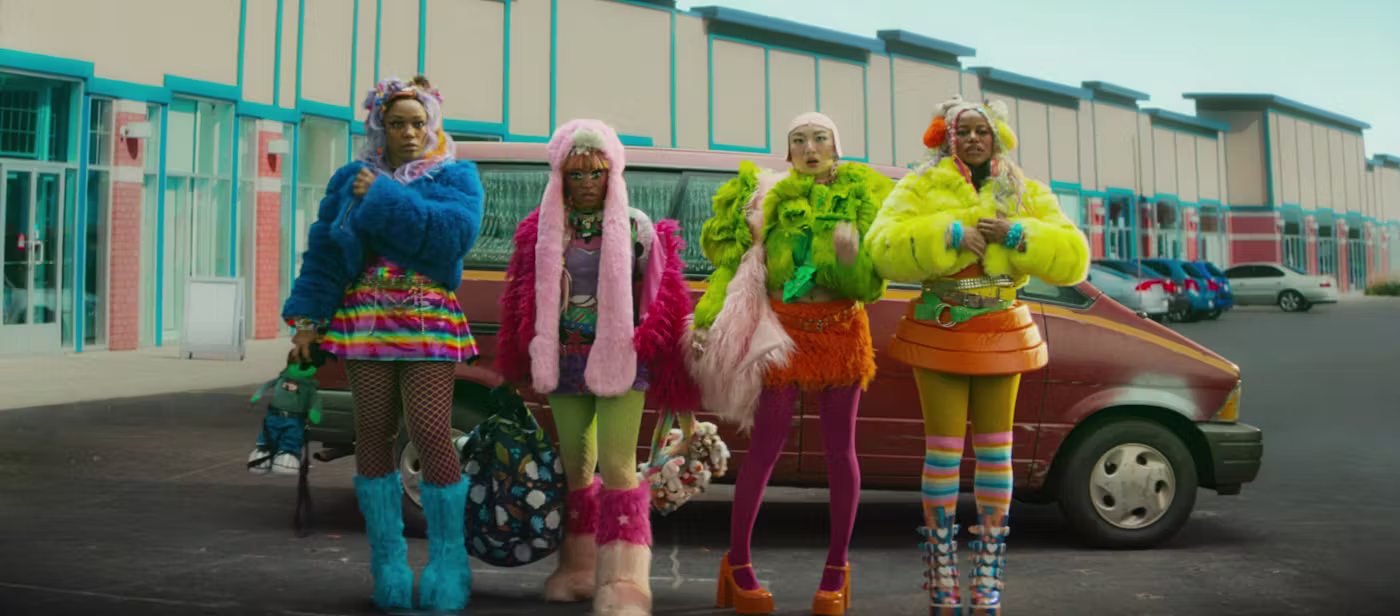 The Fashion In ‘I Love Boosters’ Has A Wildly Fun & Important Message