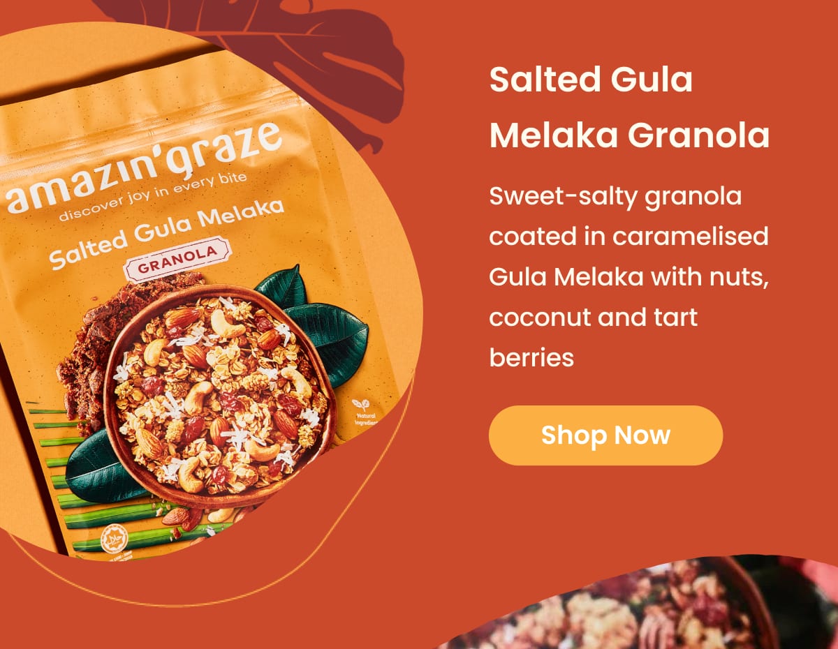 Salted Gula Melaka Granola pack with nuts and coconut on orange background