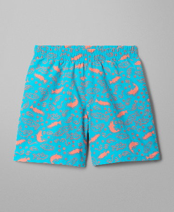 Flatlay of a boys' pair of bright blue swim trunks with fish graphics.