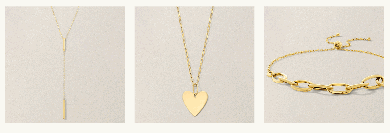 Gold chain with suspending link, flat heart pendant on paper clip chain & gold bracelet with oval links & bolo clasp.