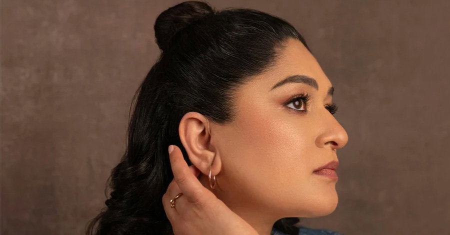 A woman with a hearing aid