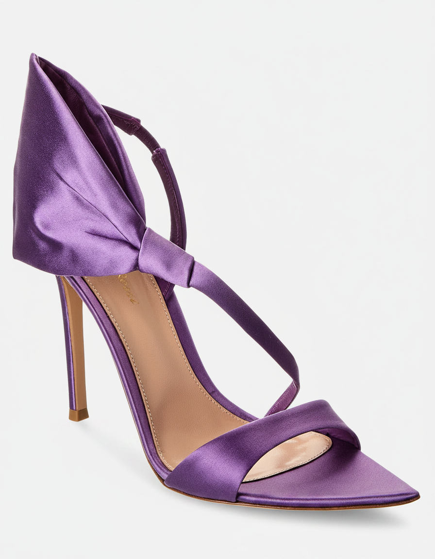 Purple satin stiletto sandal with a bow detail and ankle strap.