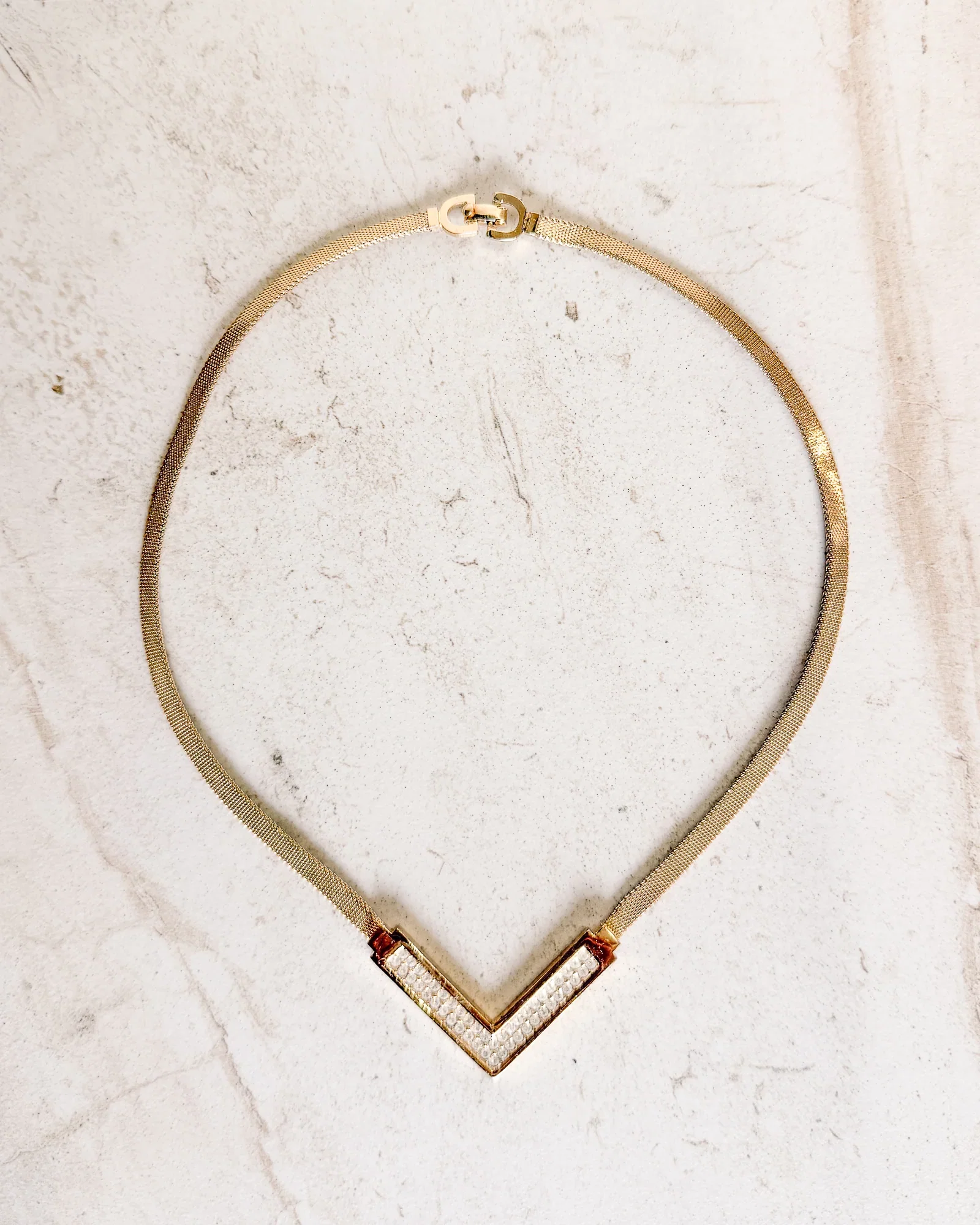Image of Vintage Signed Gold Toned V Rhinestone Shaped pendant Necklace