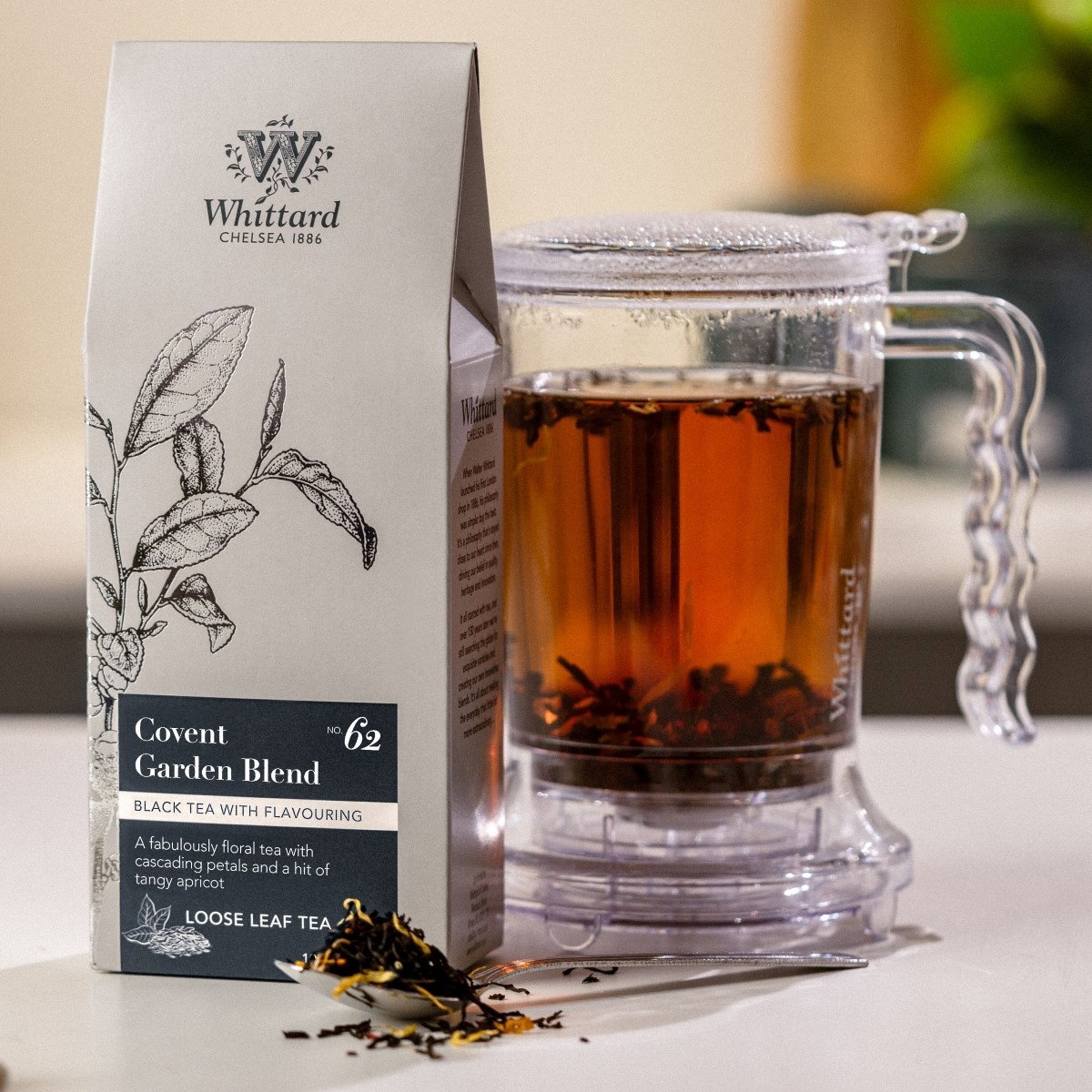 image of covent garden blend loose tea with made up drink in infuser