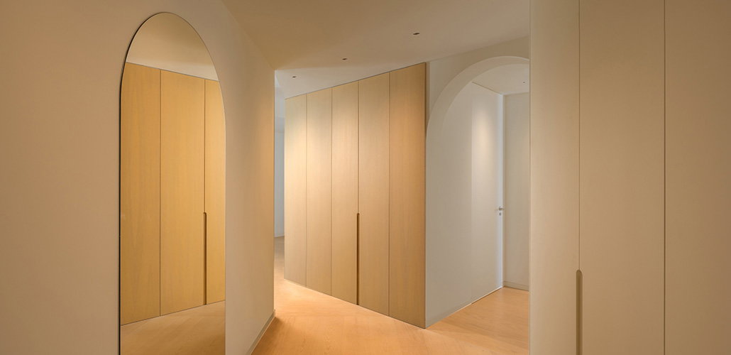 Soft lighting filling a hallway.