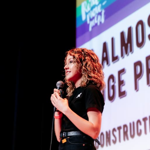 The Get Real Movement staff speaking on stage.