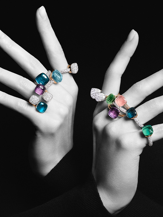 Person wearing Pomellato Nudo collection rings