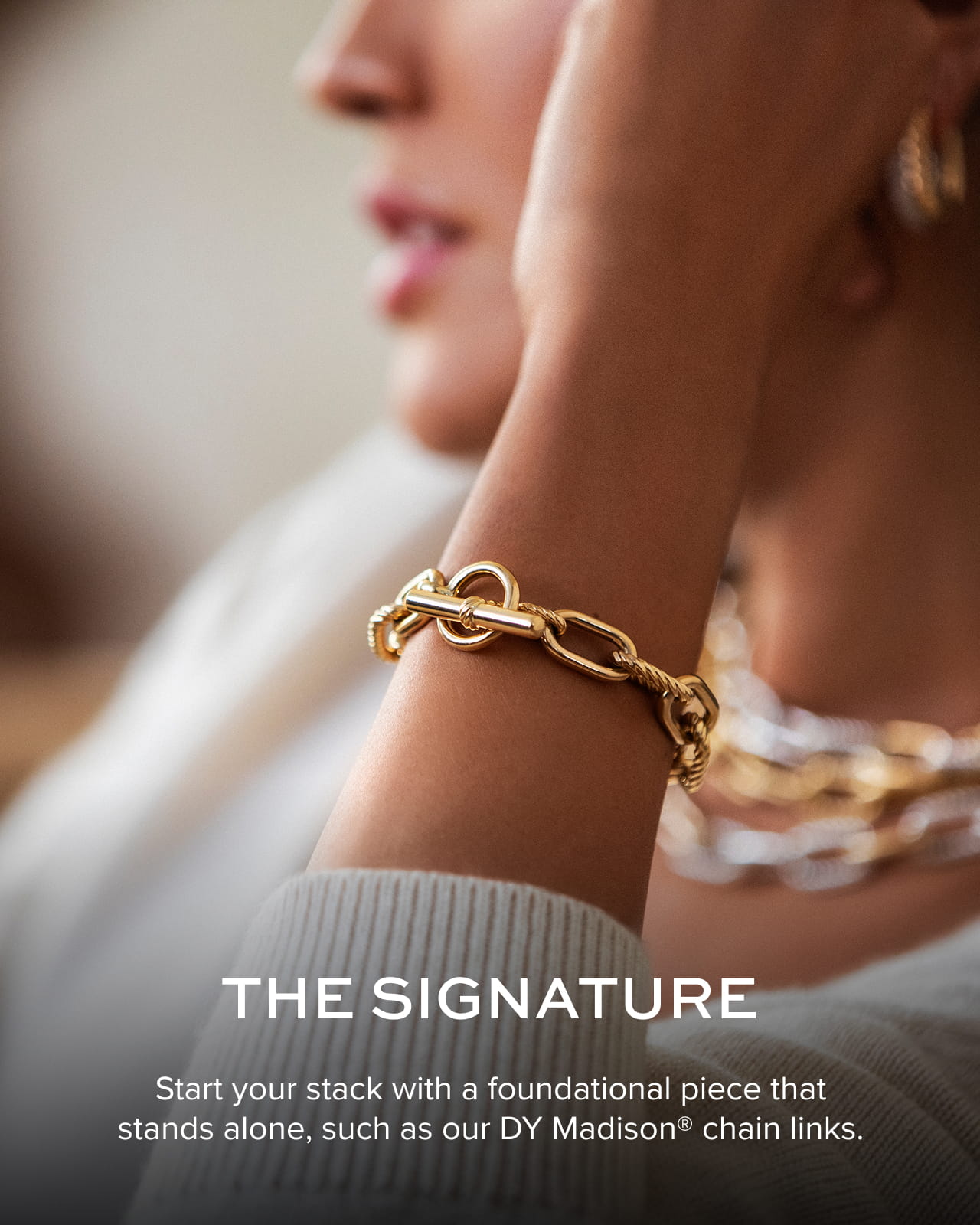 The Signature: Start your stack with a foundational piece that stands alone, such as our DY Madison chain links. 