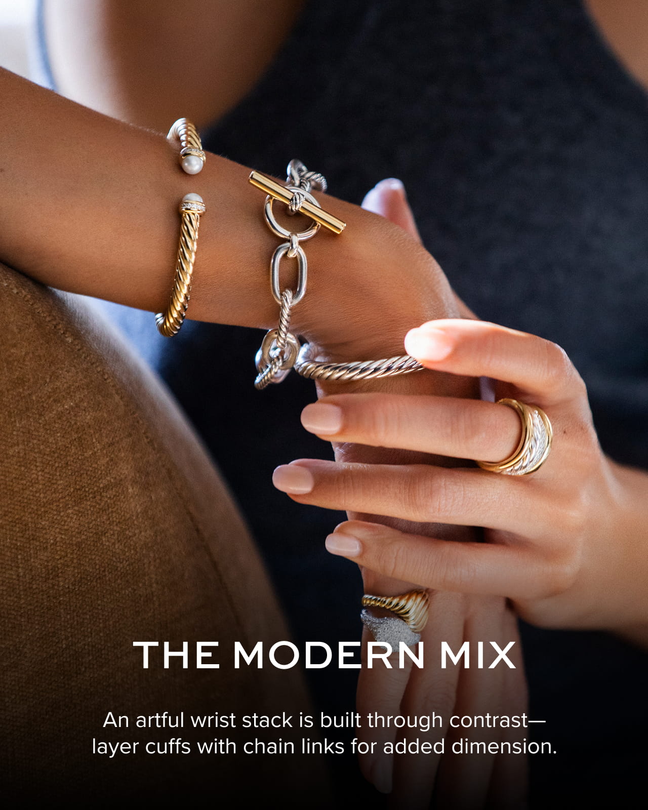 The Modern Mix: An artful wrist stack is built through contrast--layer cuffs with chain links for added dimension.