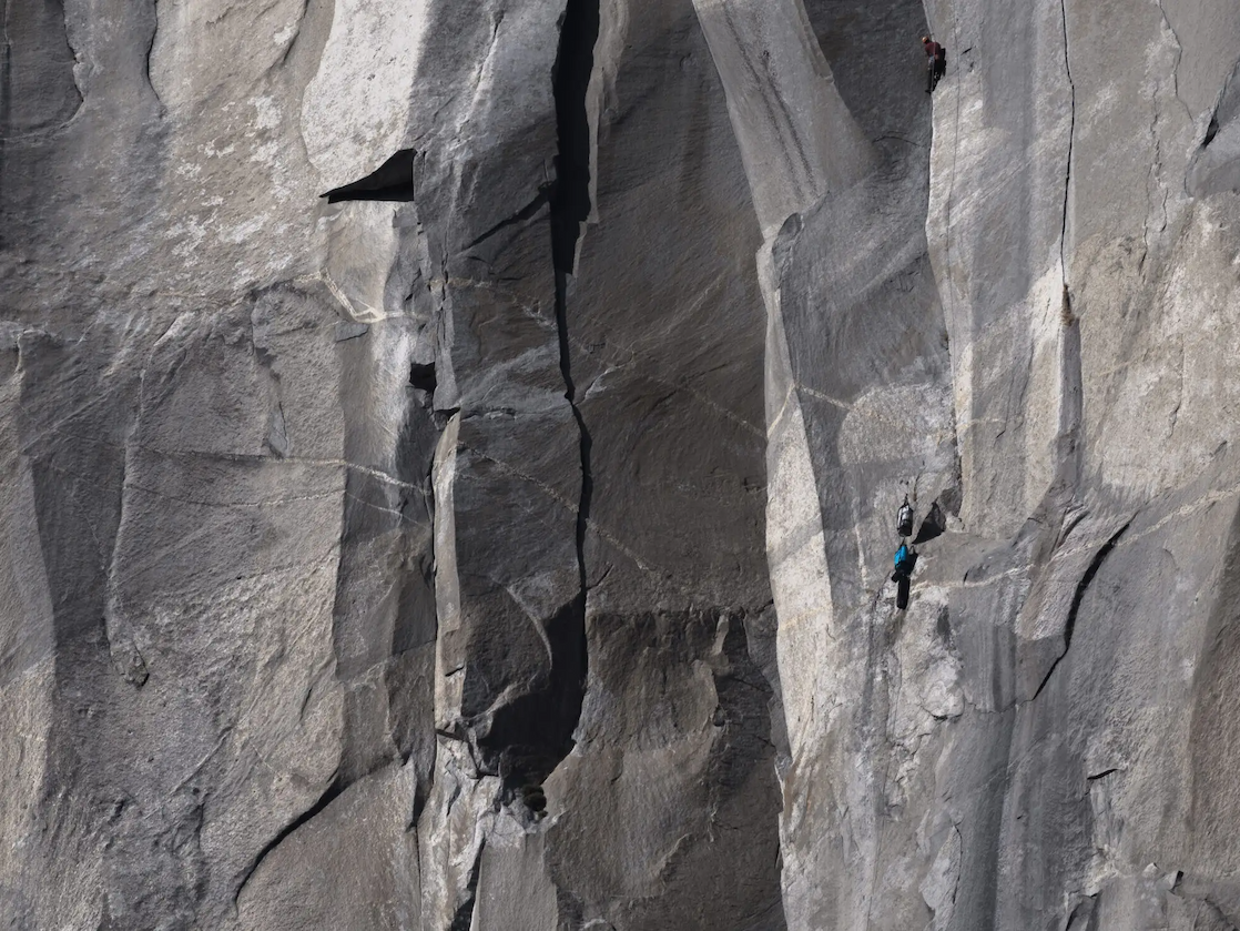 Climber on side of cliff