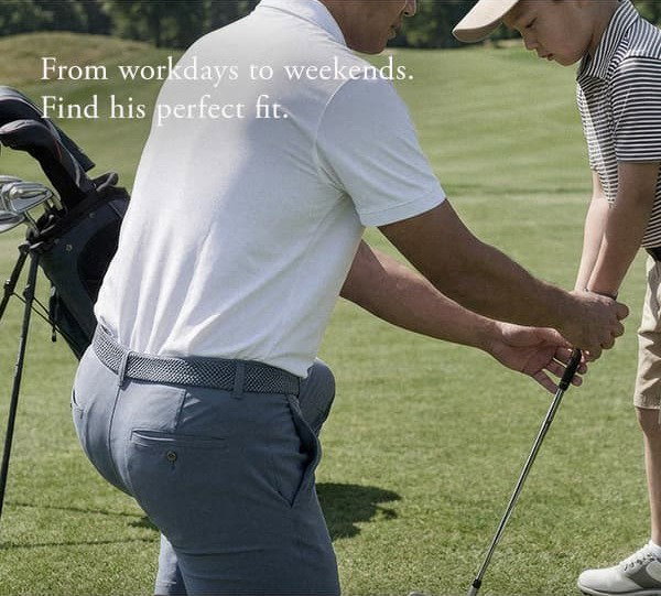 Dad shows son how to golf