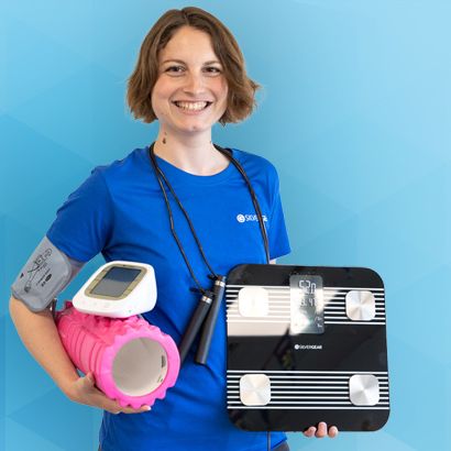 a woman wearing a blue scrubs outfit holding a pink and black case and a