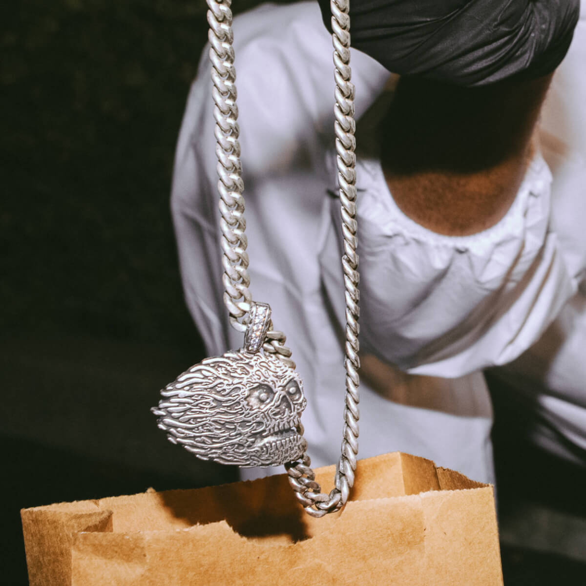 Shop new jewelry, like this chain from the King Ice x Liquid Death collab.