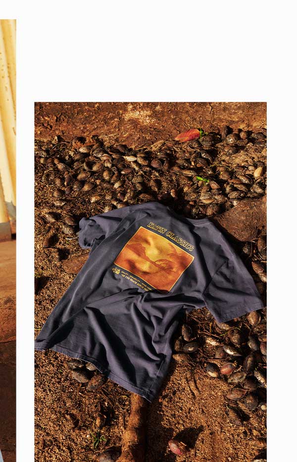 Repose Tee laying our on the ground