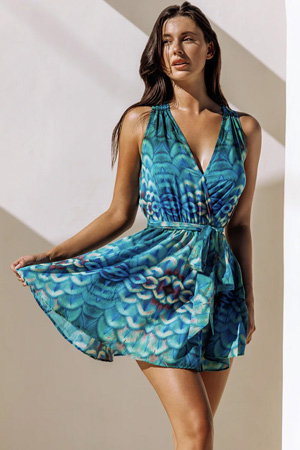 an image of a woman in a bikini top and skirt posing