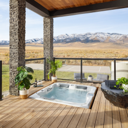 Colorado dry stack faux stone column wrap seen in exterior of home with luxury hot tub