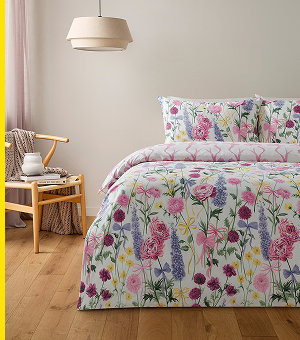 Bed with floral bedding.
