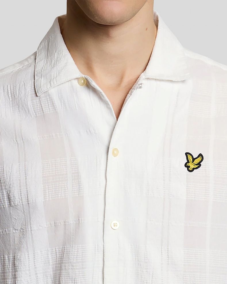 Man wears Cotton Check Textured Shirt in White