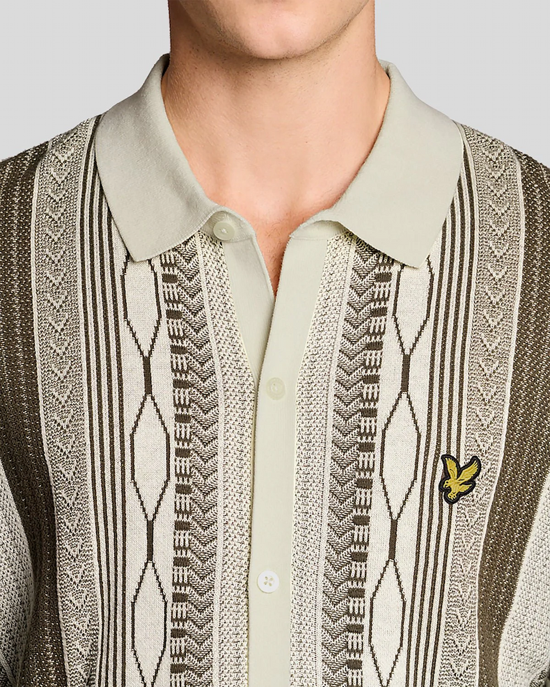 Man wears Jacquard Knitted Polo Shirt in Ice Cream Khaki Ash