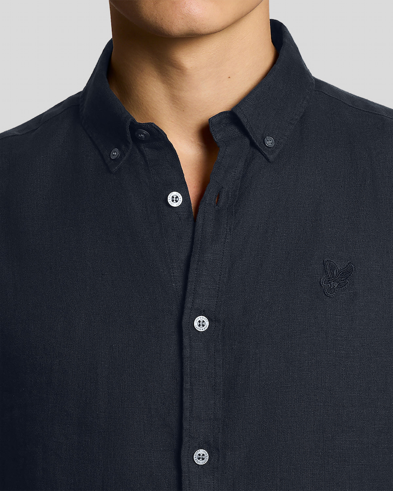 Man wears Short Sleeve Linen Shirt in Carbon