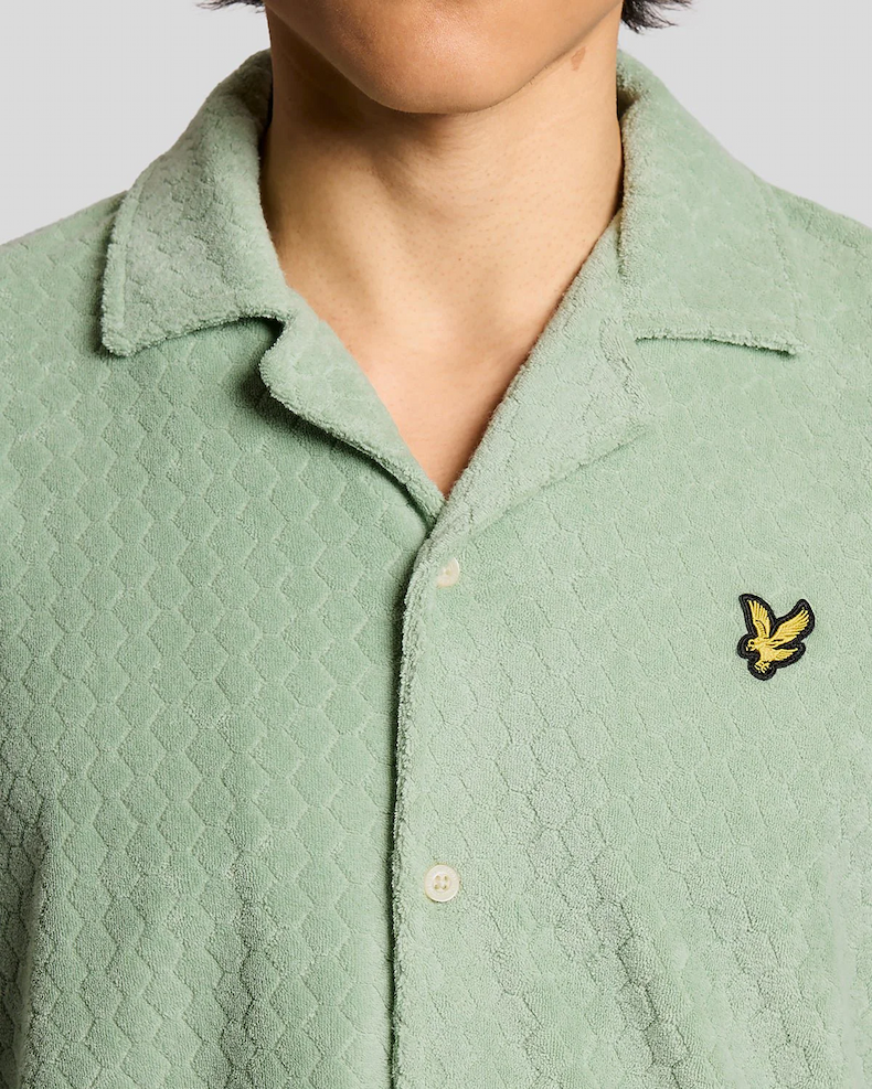 Man wears Honeycomb Effect Towelling Shirt in Misty Sage