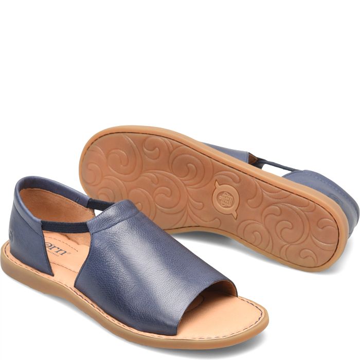 Cove Modern flat sandal in blue.