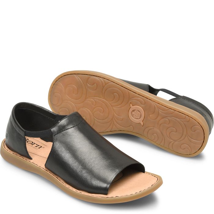 Cove Modern flat sandal in black.