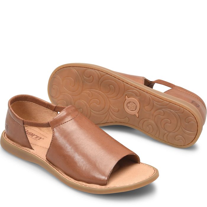 Cove Modern flat sandal in brown.