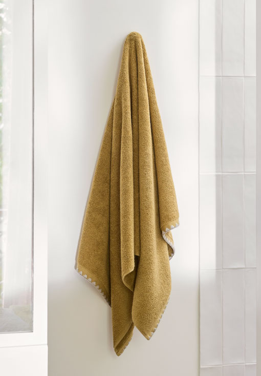 Serviette de toilette Neryda jaune sable et beige