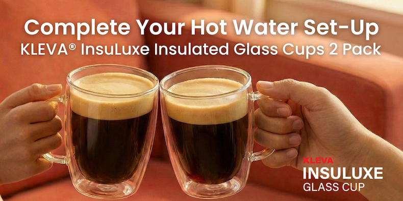 Two insulate glass cups with hot coffee clinking