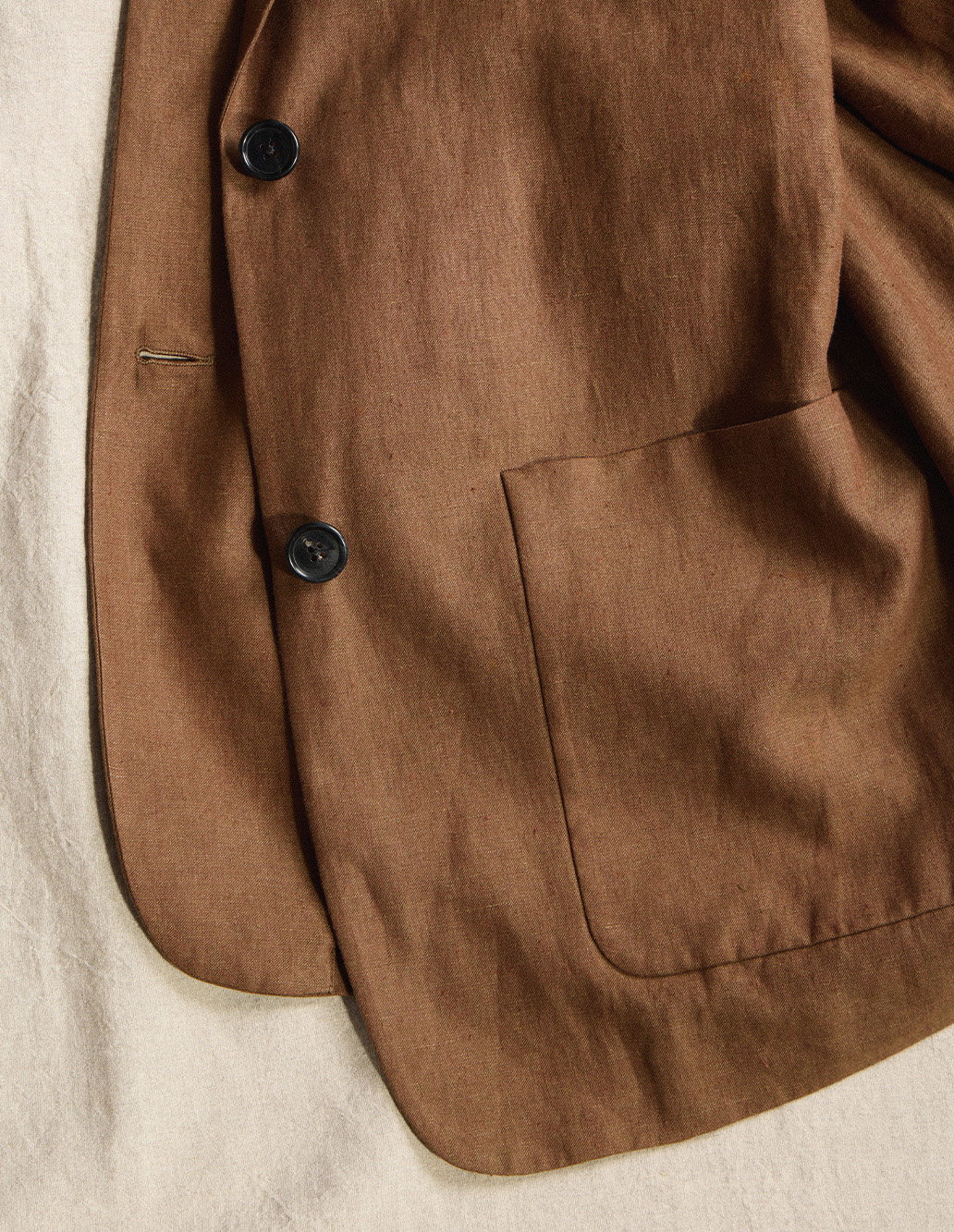 Brown European linen jacket with dark buttons