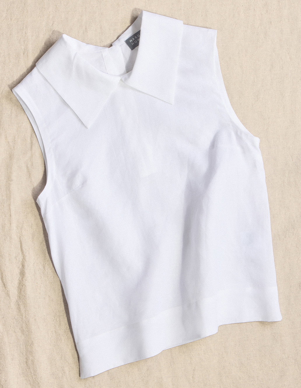White sleeveless linen top