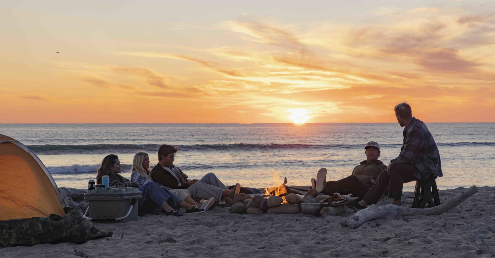 Group on the beach at sunset