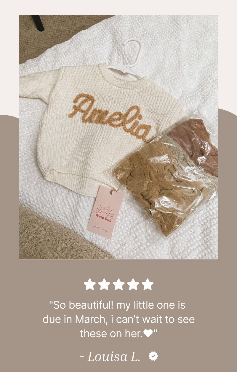 Flat lay of a personalized knit sweater, soft blanket, and packaged baby items above a customer quote with star rating.