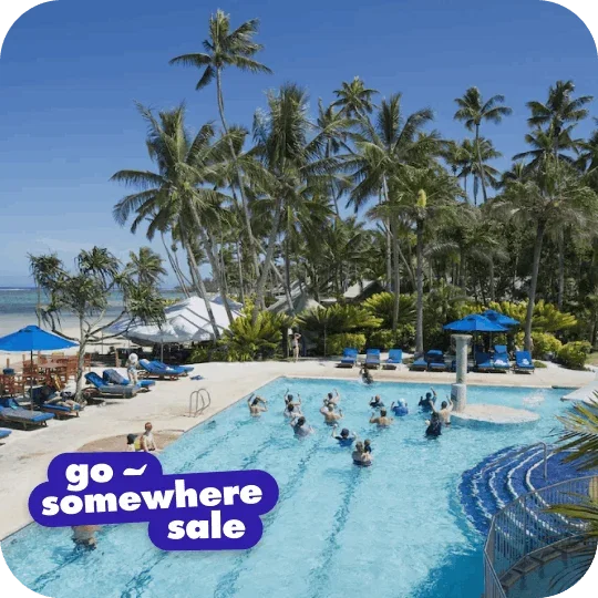 People in a outdoor pool at a resort