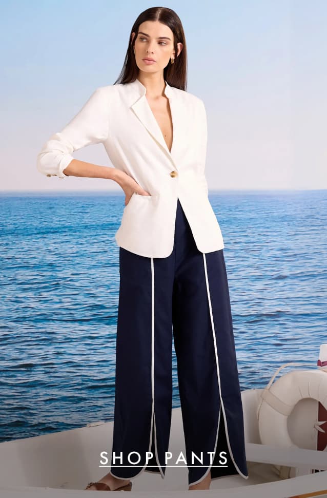Shop pants. The lady wearing the Piped Wide Leg Linen Split Seam Pant.