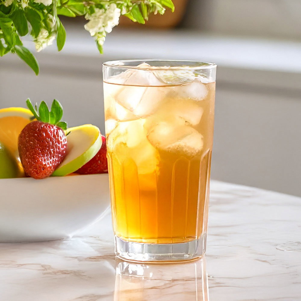 tall glass of iced tea in a kitchen setting