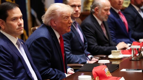 President Donald Trump (2nd-L) speaks as (L-R) Secretary of State Marco Rubio, Secretary of Defense Pete Hegseth, Commerce Secretary Howard Lutnick and Transportation Secretary Sean Duffy listen during a Cabinet meeting in the Cabinet Room of the White House.